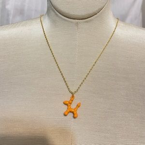 NEVER WORN orange balloon dog necklace